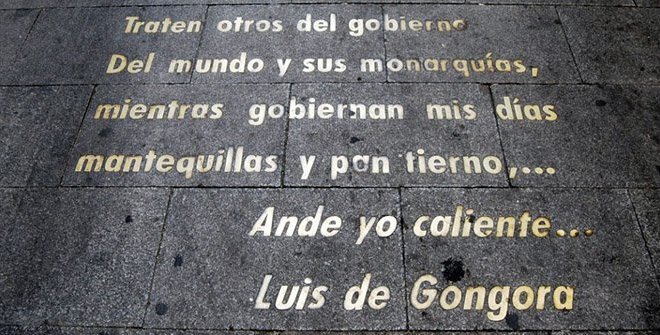 letras - oro - suelo - calle - adoquines